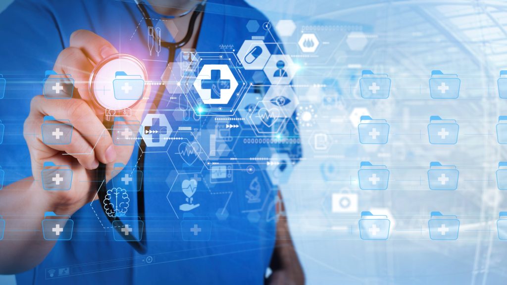 Science Saturday: Mayo Clinic doctor visits of the future could be powered by ‘omics’ research closeup of the hand of a white medical worker holding a stethoscope up to a transparent graphic of medical symbols