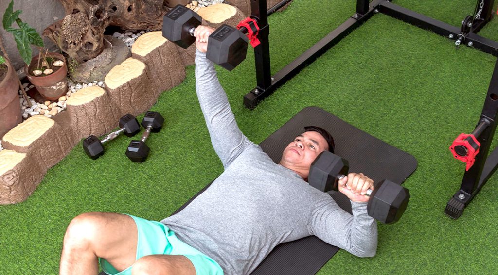 Unilateral Dumbbell Floor Press: How To, Benefits Unilateral Dumbbell Floor Press: How To, Benefits
