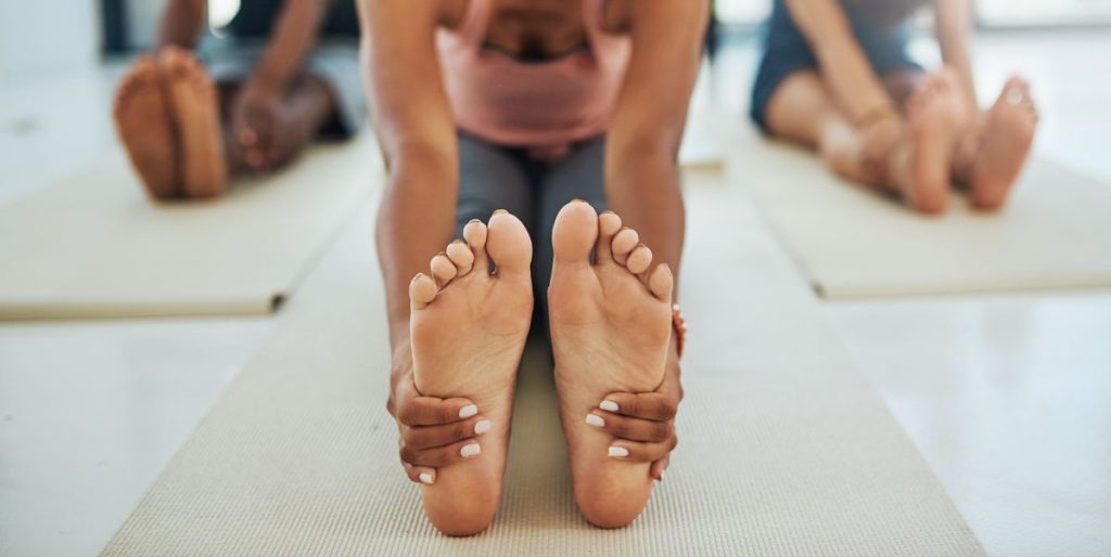 7 Peeling Feet Causes And Treatments, According To Experts