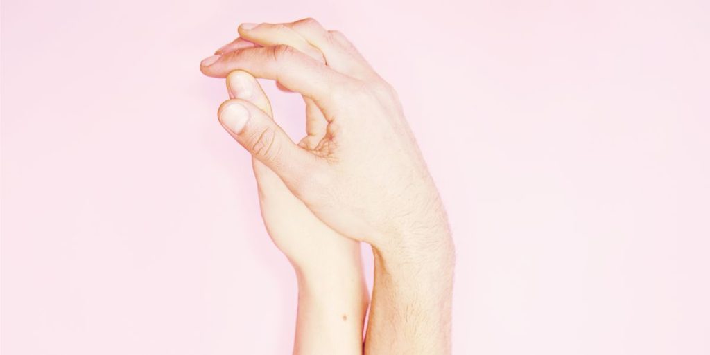 8 Hand-Holding Styles + Their Meanings, Per Body Language Experts