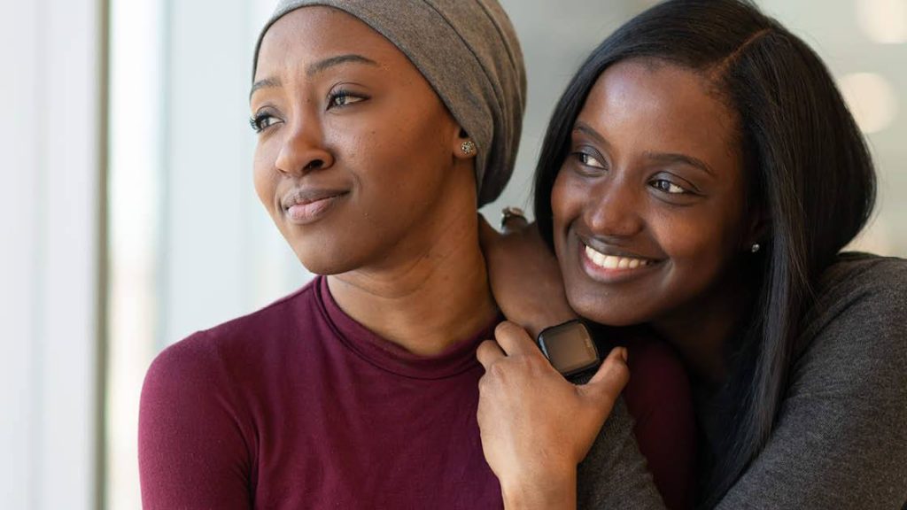 Mayo Clinic Minute: Health disparities in gynecologic cancers Two black women, mother and daughter looking out a window