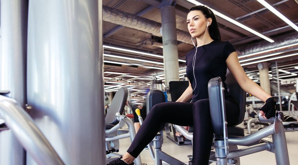 Hip Abductor Machine: Glute Benefits, Myths, Research & Programming Guide